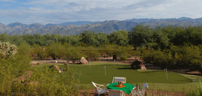 The Casitas at Smokey Springs Ranch putting green on property